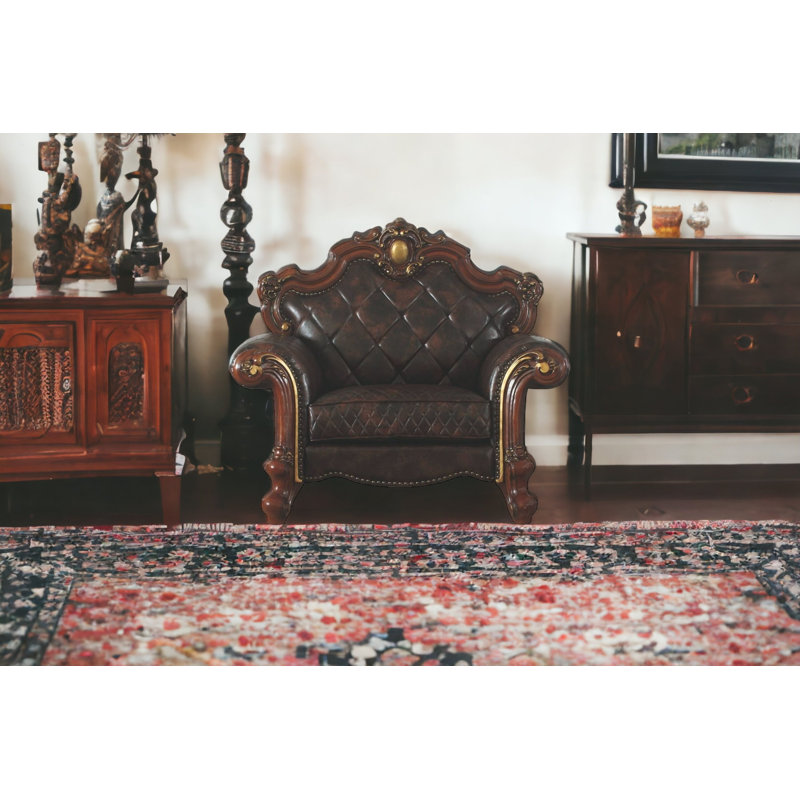 Fauteuil Chesterfield 50 po en similicuir chocolat et coussin décoratif