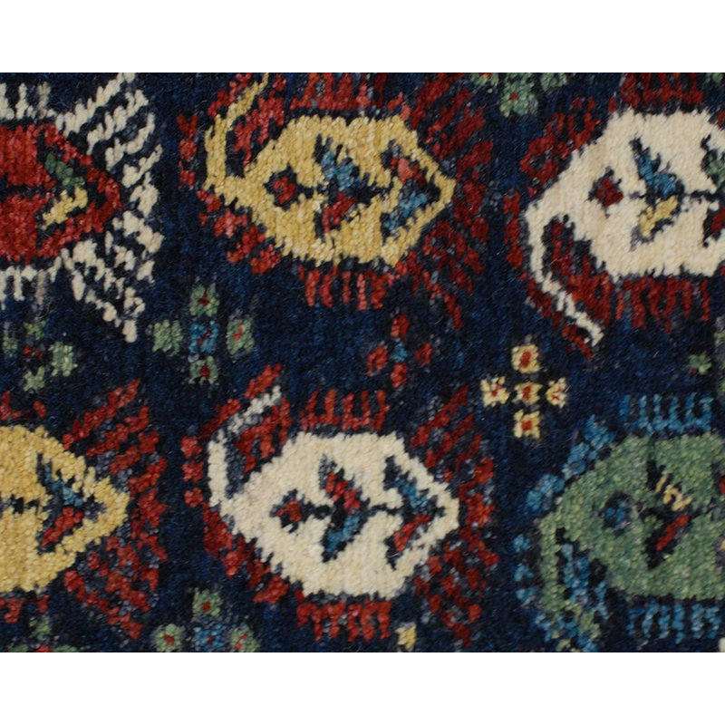 Seychour Wool Oriental Area Rug in Green/Red
