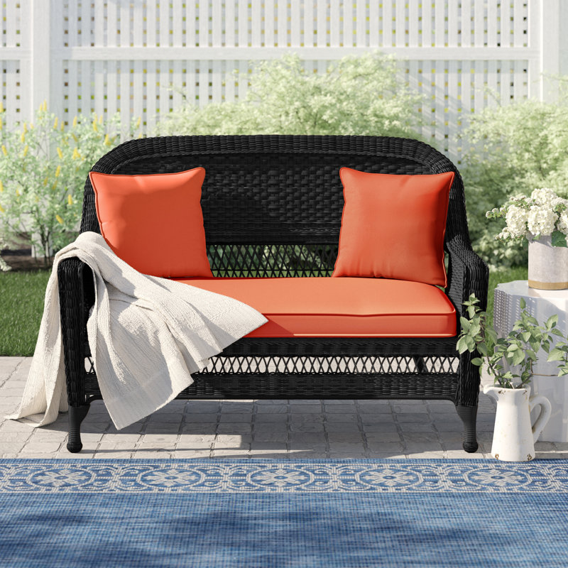 Armbruster 52'' Wide Straight Wicker Loveseat with Cushions, Red Orange, Black