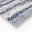 Tapis tissé à rayures bleues