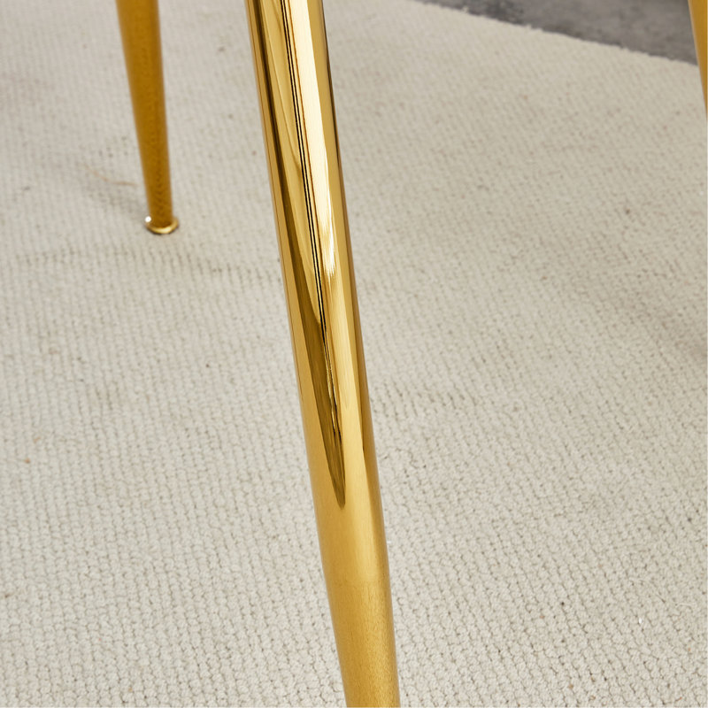 Un plateau de table en verre d'un diamètre de 40 pouces et une table de salle à manger circulaire minimaliste moderne avec des pieds en métal plaqué or