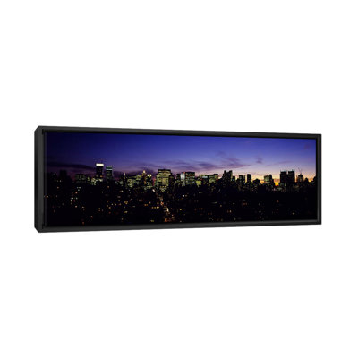 " Skyscrapers In A City Lit Up At Night, Manhattan, New York City, New York State, USA " by Panoramic Images
