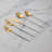 Mazzy Gold with White-Handle 20-Piece Flatware Set