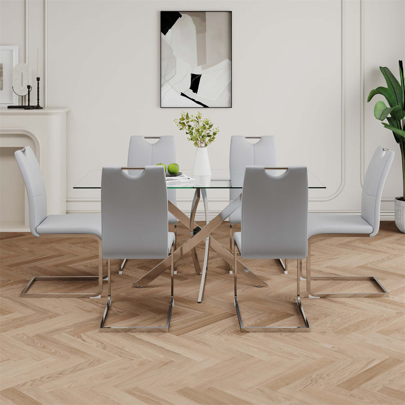 Table de salle à manger en verre de style moderne avec un design transparent élégant et une base de support durable