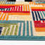 Tapis d'intérieur / extérieur bleu / rouge / orange tissé à la machine à motif géométrique Alkhoury-960421056