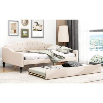 Lit de jour pleine grandeur avec capitonnage beige et gigogne simple - Robust & Choice complète la décoration intérieure