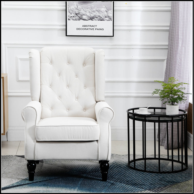 Fauteuil à oreilles confortable avec coussins capitonnés et accoudoirs arrondis pour un style de vie élégant