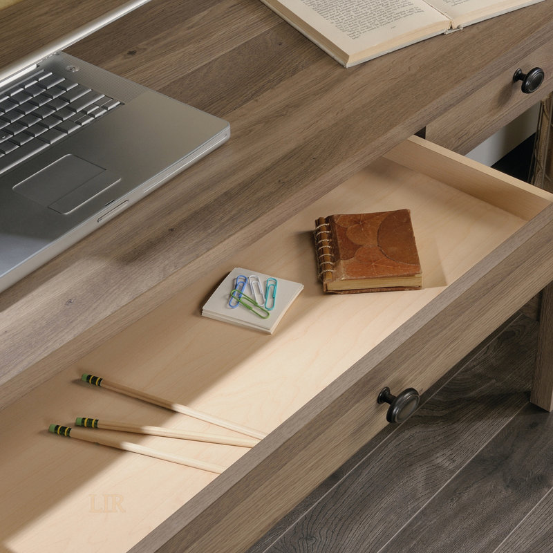 Bureau contemporain avec une surface de travail spacieuse et deux tiroirs, parfait pour les intérieurs modernes et rustiques.