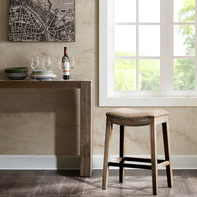 Saddle Counter Stool With Upholstery And Copper Nail Ornament Feature Magnificent Metal Kick Plate Attachment