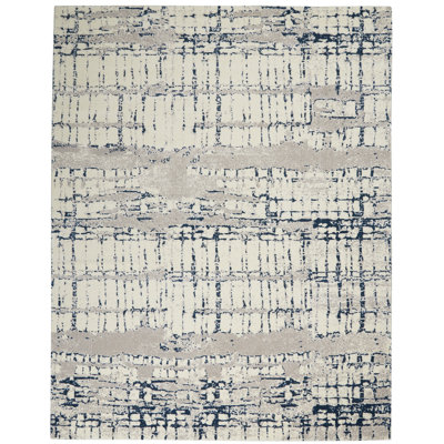 Tapis abstrait bleu marine / gris