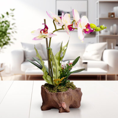 Faux orchidée réaliste dans un pot à fleurs aspect bois - blanc et brun