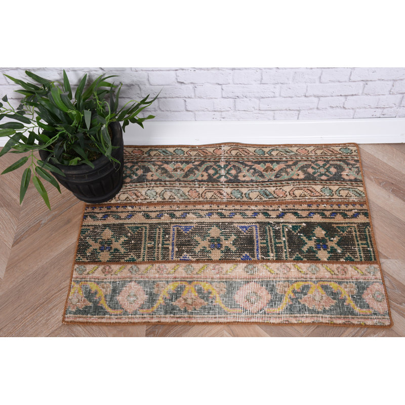 Vintage Turkish Handmade Anatolian Carpet With Floral Design For Boho Decor As an Entryway Mat Or Rustic Small Rug