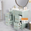 Meuble-lavabo vert avec lavabo en céramique, structure en bois massif, portes à fermeture douce et rangement réglable
