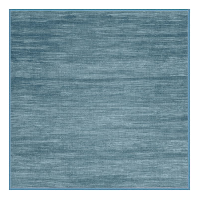 Tapis bleu uni lavable à la machine