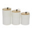Ensemble de pots décoratifs en céramique blanche texturée avec couvercles en bois et décorations perlées