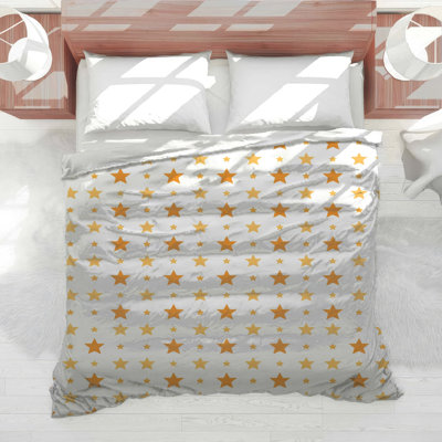 Édredon orange à étoiles jaunes