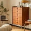 Commode d'appoint arrondie avec pattes en acier inoxydable