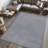 Twyla Classic Solid Low-Pile Machine-Washable Gray Rug-967405163