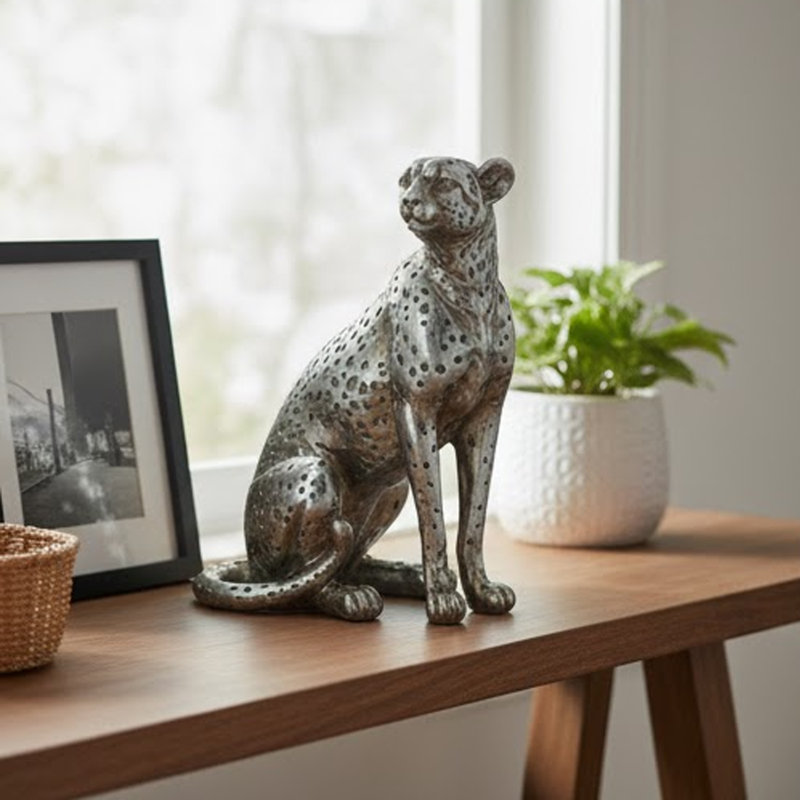 Figurine léopard Wendy assise, pierre thermolaquée, argent métallique 9 pouces