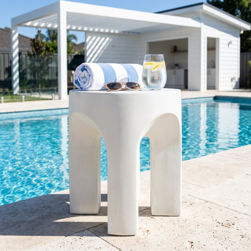 Table d'appoint moderne à plateau rond avec un design minimaliste pour une utilisation intérieure et extérieure
