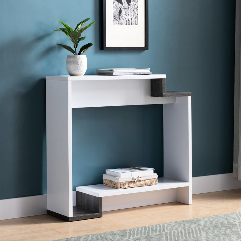 Console contemporaine blanche et grise, deux étagères ouvertes, structure à plusieurs niveaux, idéale pour les petites pièces. Ses éléments gris et ses détails raffinés décorent les petits espaces de divertissement.