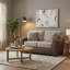 Sofa deux places en similicuir avec coussins en peau de mouton bouclée et coussins décoratifs