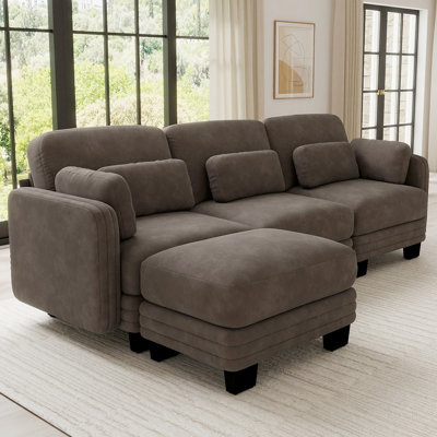 Canapé d'angle modulaire 3 places au design moderne et minimaliste capitonné, avec pouf amovible et coussins d'assise épais et confortables, idéal pour le salon ou la chambre. Revêtement en chenille.