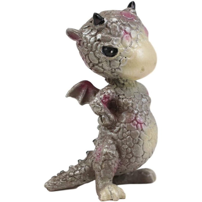 Petit dragon de l’été avec des taches de pois rose