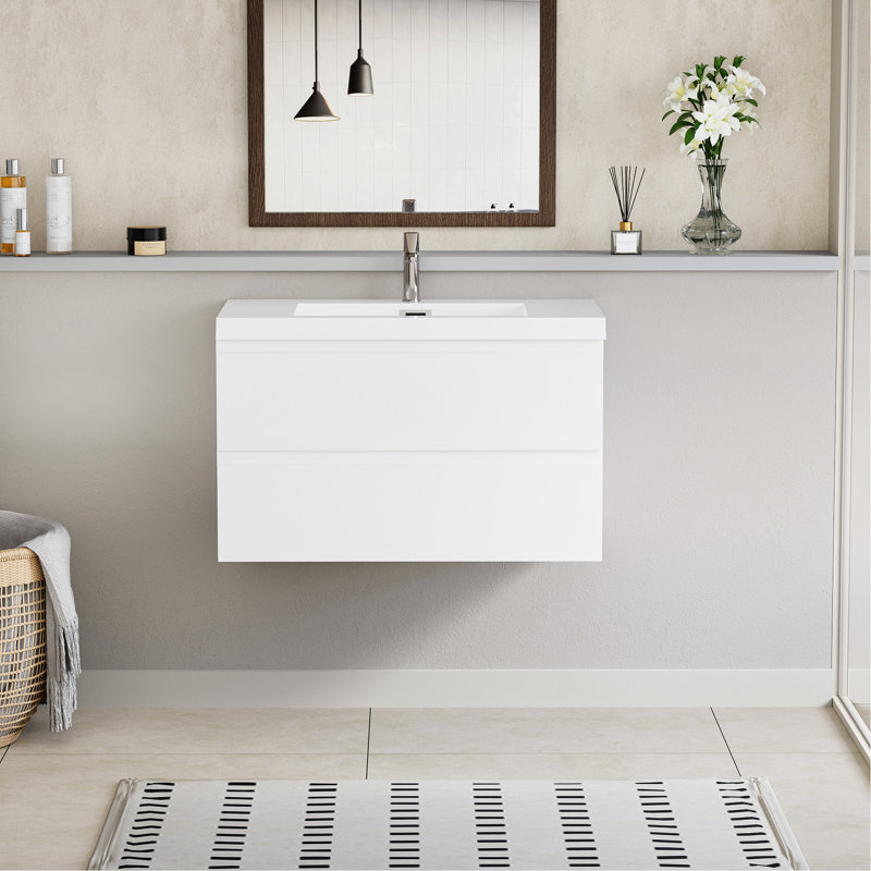Meuble-lavabo flottant avec lavabo, mural et peu encombrant, idéal pour la conception et l'organisation de salles de bain modernes.