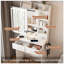 Bureau de maquillage compact avec lumières DEL réglables, prises de courant intégrées et rangement dissimulé pour les petites chambres-129911240