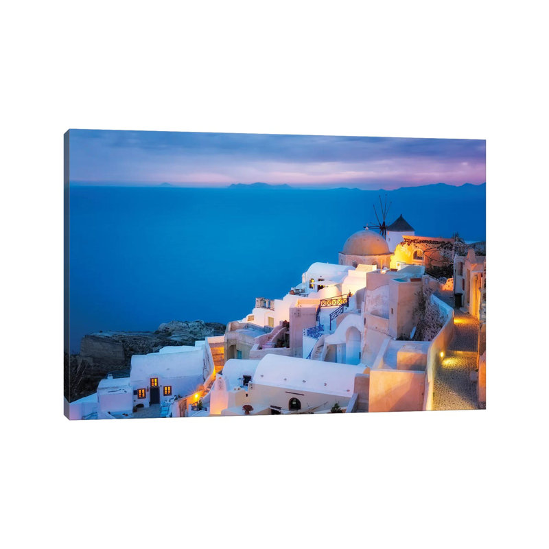 Europe, Greece, Santorini, Oia. Sunset On Coastal Town. by Jaynes Gallery - Wrapped Canvas Print