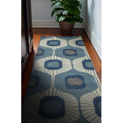 Tapis en laine bleu clair à motif abstrait Hemmer