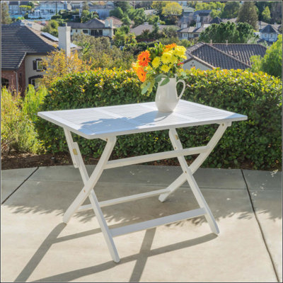 Table de salle à manger pliable en bois d'acacia, résistante aux intempéries et peu encombrante pour une utilisation extérieure
