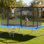 Trampoline extérieur, trampoline rectangulaire de 8 pi x 14 pi, trampolines récréatives approuvées par l'ASTM avec filet d'enclos, capacité de poids maximale de 265 lb, trampolines rectangulaires antirouille pour enfants et adultes