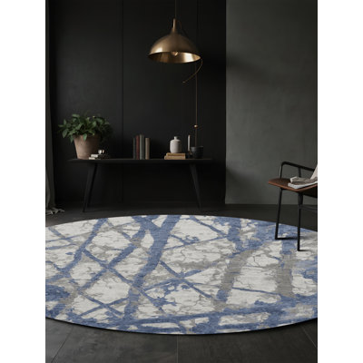 Tapis gris soyeux et moelleux