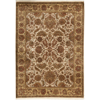 Tapis ivoire et doré de haute qualité noué à la main