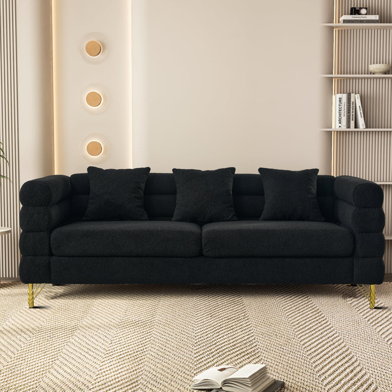 Pevzner Luxurious and comfortable upholstered sofa with metal legs and pillows for living room and reception area