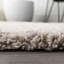 Tapis beige à poils longs Anttwan-863744224