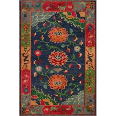 Tapis à motif floral dans des tons de couleurs mélangées
