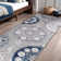 Chartier Machine Woven Floral Area Rug