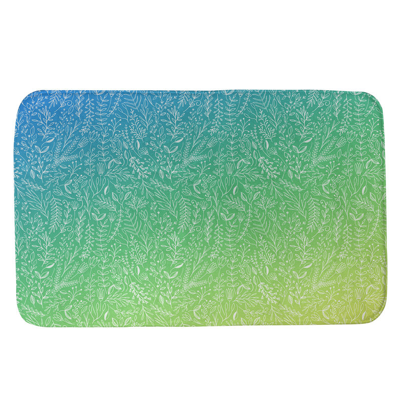 Tapis pour salle de bain floral ditsy Leffel, l 21 po x L 34 po, Bleu / Jaune