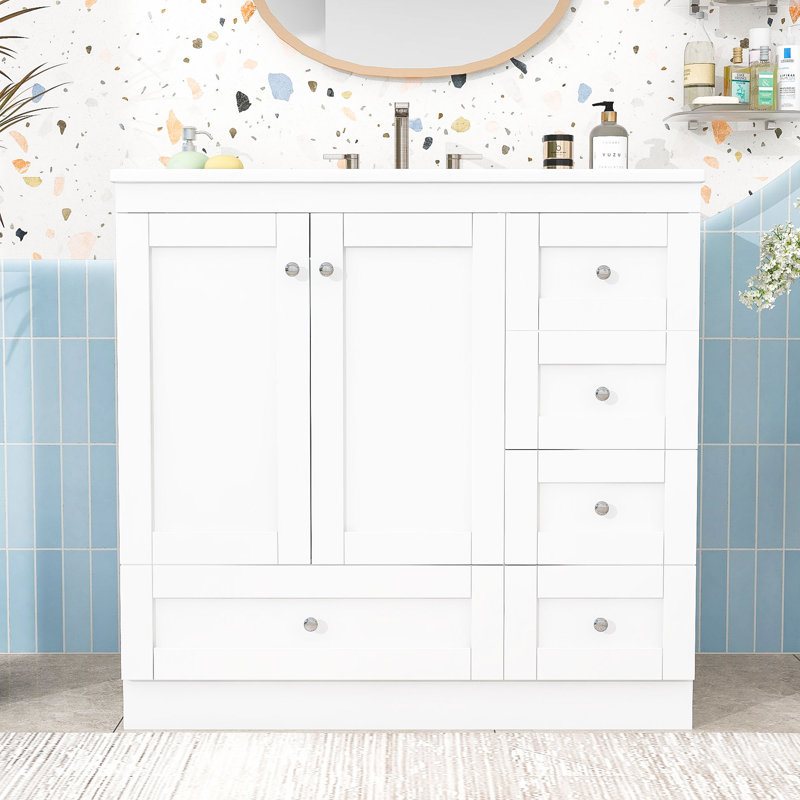 Meuble-lavabo autoportant avec lavabo en résine intégré, tiroirs à fermeture en douceur et portes pour la salle de bain