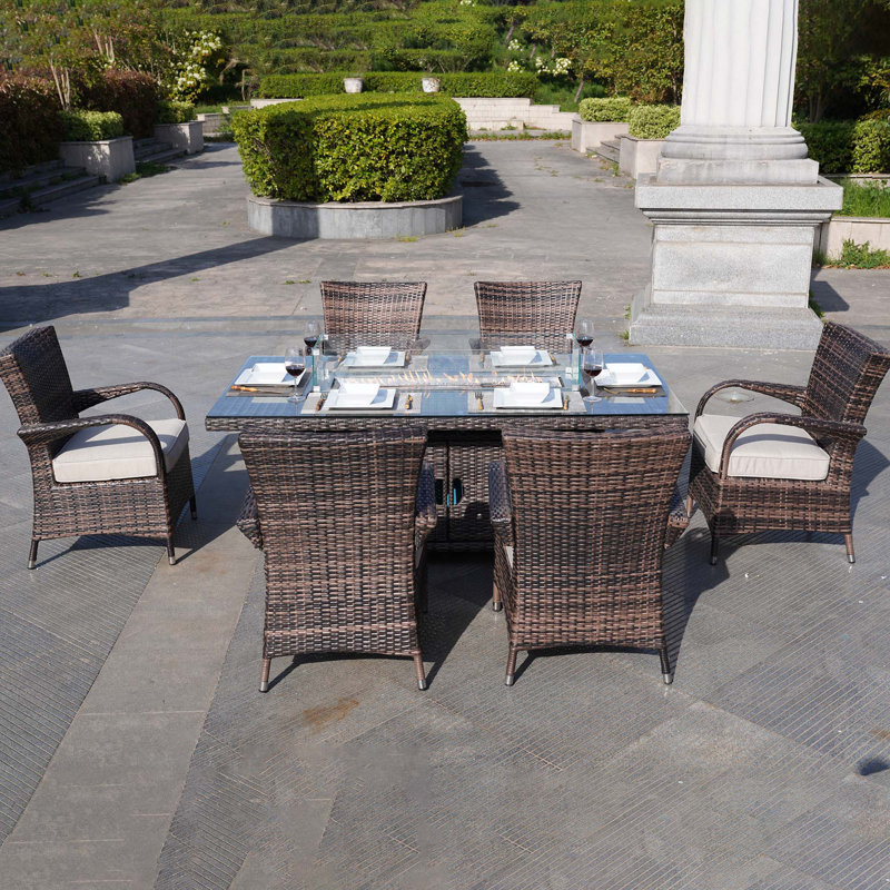 Ardala 6 - Person Wicker Patio Dining Set with Rectangular Table , Cushions Included, Brown