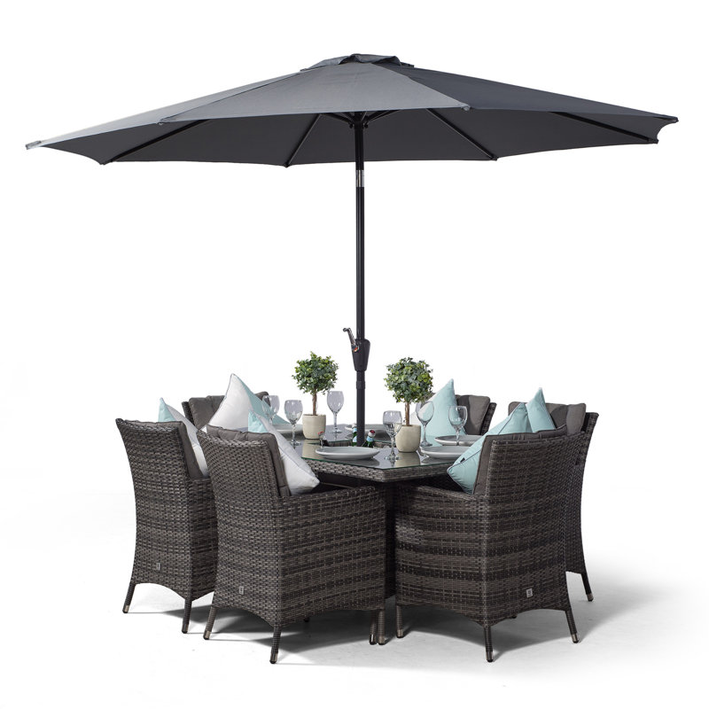 Karcher 6 - Person Wicker Patio Dining Set with Rectangular Table , Cushions Included, Grey