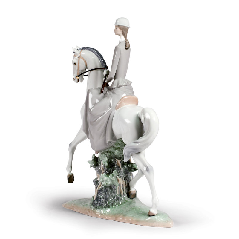 Woman on Horse Figurine