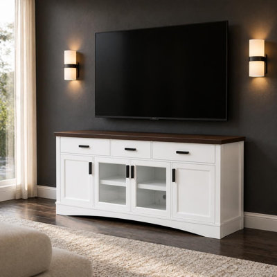 Meuble télé multimédia de 170 cm de large avec portes vitrées, tiroirs de rangement et tablettes réglables. Console multimédia robuste en bois d'ingénierie avec gestion des câbles intégrée. Convient aux écrans jusqu'à 165 cm. Solution de rangement polyvalente pour le mobilier et les appareils multimédias du salon.