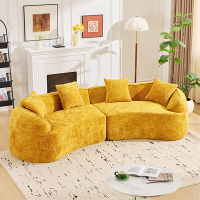 Curved Sofa With Four Pillows