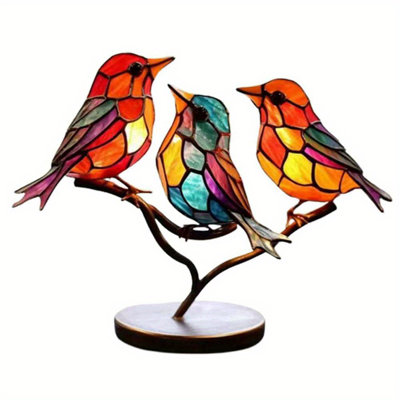 Figurine d'oiseau en acrylique sur une branche