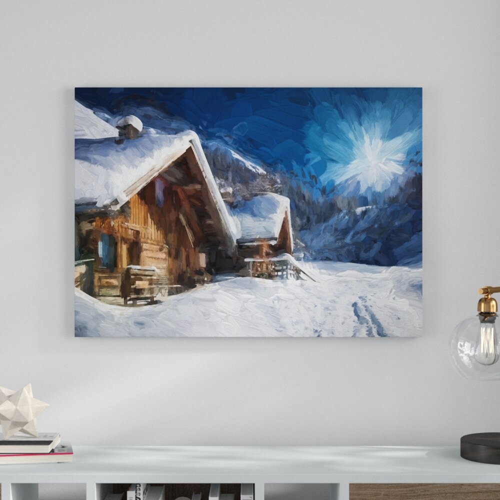 Leinwandbild „Verschneite Hütten in winterlicher Alpenlandschaft“, Grafikdruck