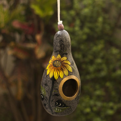 Maison d'oiseaux tournesol et terre